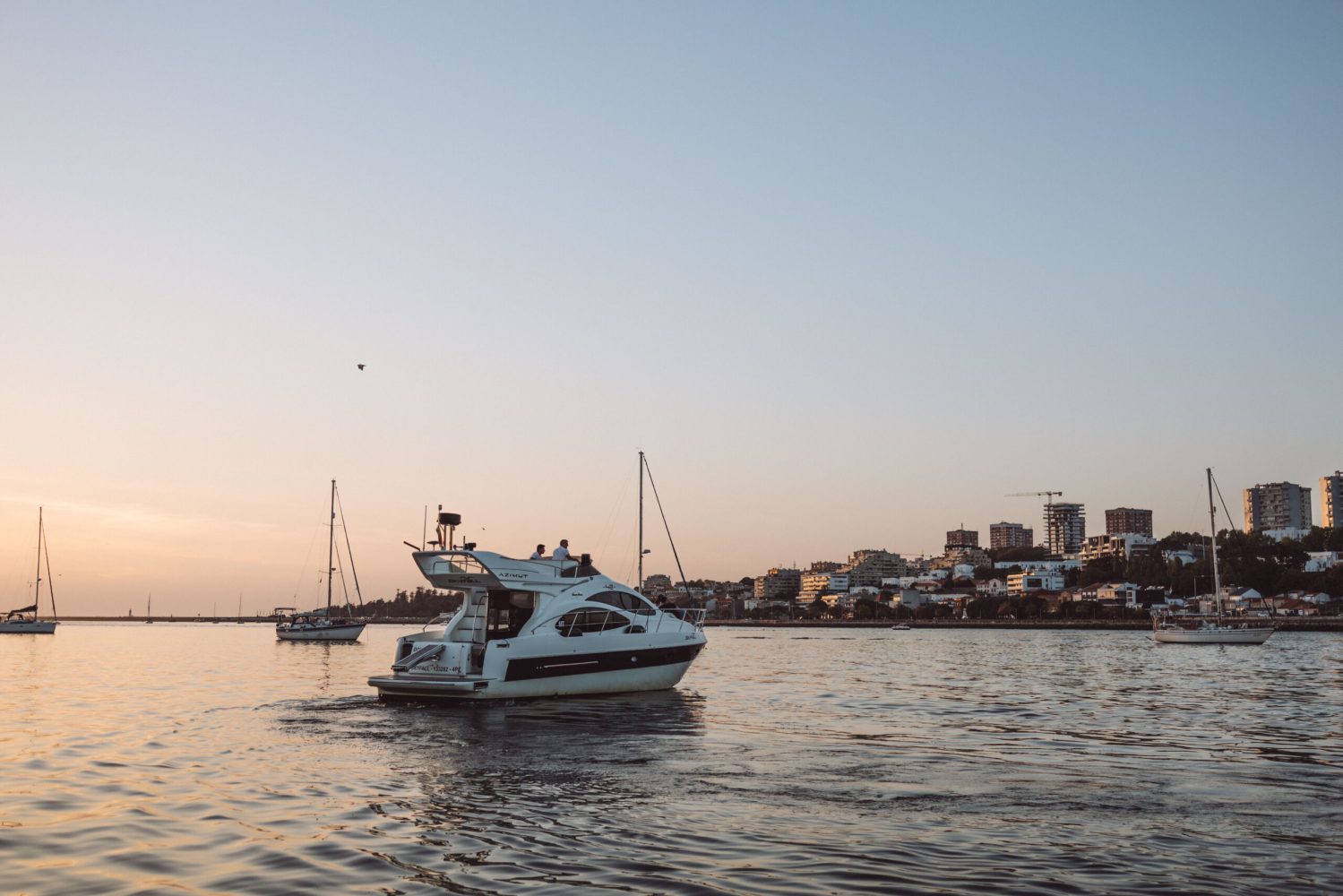 a boat is docked next to a body of water